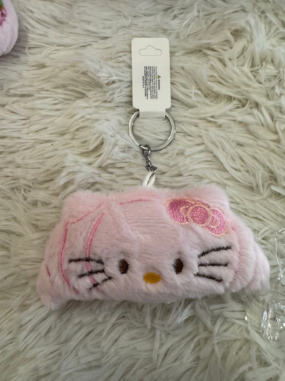 Sanrio Hello Kitty pink plush croissant  keychain with bow